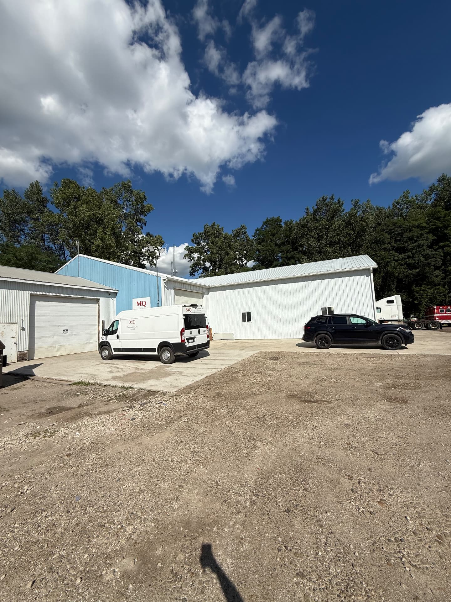M&Q service van and shop buildings
